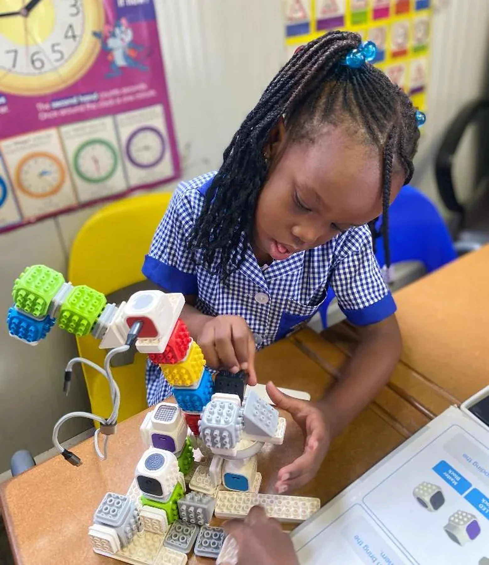 Young learner building a robot