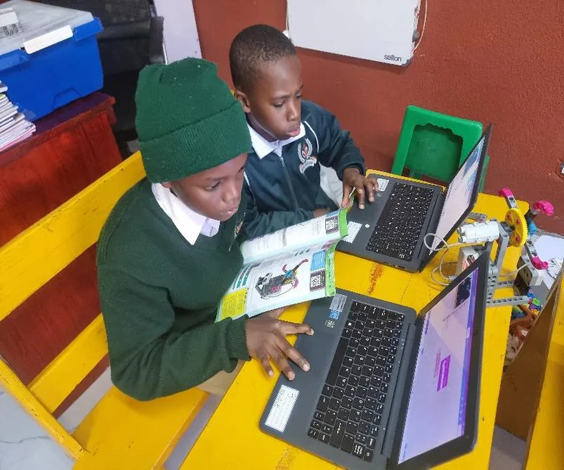 Girls building robots together